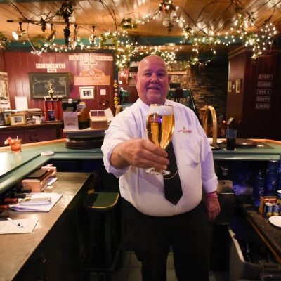Related Article: Check out these classic supper clubs in Wisconsin | bartender at spangs restaurant vilas county wi