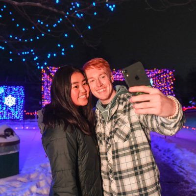 Related Article: Light up your holiday season with these festive displays | Couple taking a selfie at Rotary Winter Wonderland holiday light display Marshfield WI