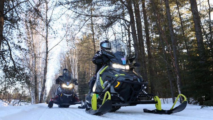 Article: Winter getaways for trail lovers | Snowmobiling in Oneida County Wisconsin