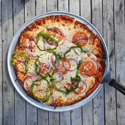Related Article: Where to find some of the state’s best pizza | Pizza on table at Clayton's 1881 Room in Three Lakes in Oneida County Wisconsin