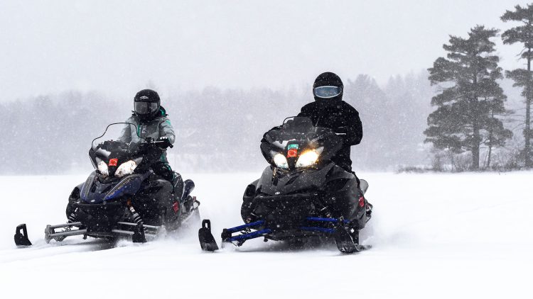 Article: Your guide to snowmobiling Wisconsin’s Northwoods | Snowmobiling on Pine Lake Rhinelander WI
