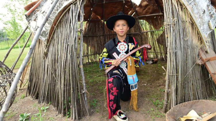 Article: Wisconsin history museums worth a visit | Boy at pow wow in Lac du Flambeau Vilas County Wisconsin