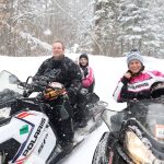 Article: See why Boulder Junction is a snowmobiler’s paradise | Family on snowmobile trails in Boulder Junction Wisconsin