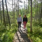 Article: Where to find great hiking & walking trails in Wisconsin | Mother and daughter walking on Raven Trail near Minocqua, Wisconsin