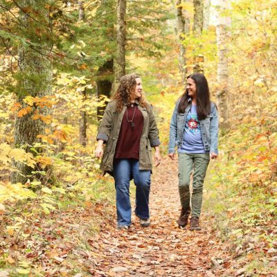 Related Article: Don’t miss these fall color hikes in Boulder Junction | Women hiking on Fallison Lake Nature Trail Boulder Junction WI