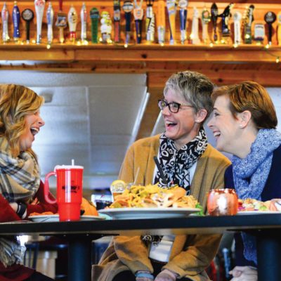 Related Article: Where to find a fish fry in Marshfield | Three women sitting at a table laughing at Nutz Deep II restaurant in downtown Marshfield Wisconsin