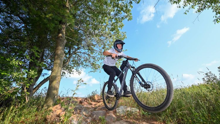 Article: Explore Powers Bluff and discover fun all year long | Boy riding mountain bike trails at Powers Bluff County Park near Marshfield Wisconsin