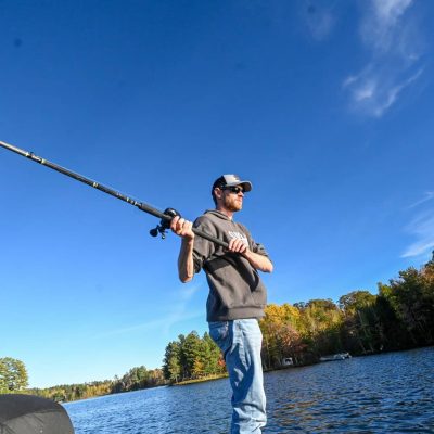 Related Article: Where to find musky, walleye & more in Oneida County | Man casting a musky pole from a boat on a lake in Oneida County Wisconsin